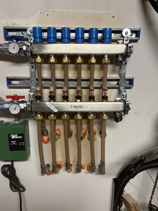 Plumber performing Gas Line Installation at a residential property in Wharton